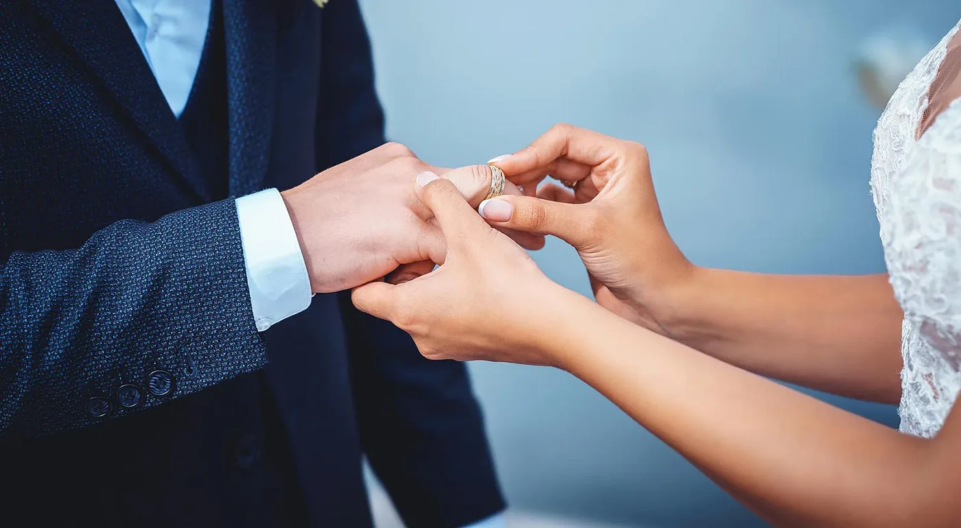 Exchanging rings during the wedding ceremony