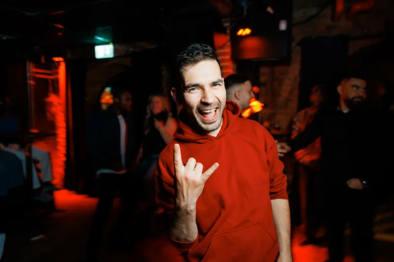 Anton Kozyr photographing a party in Gothenburg
