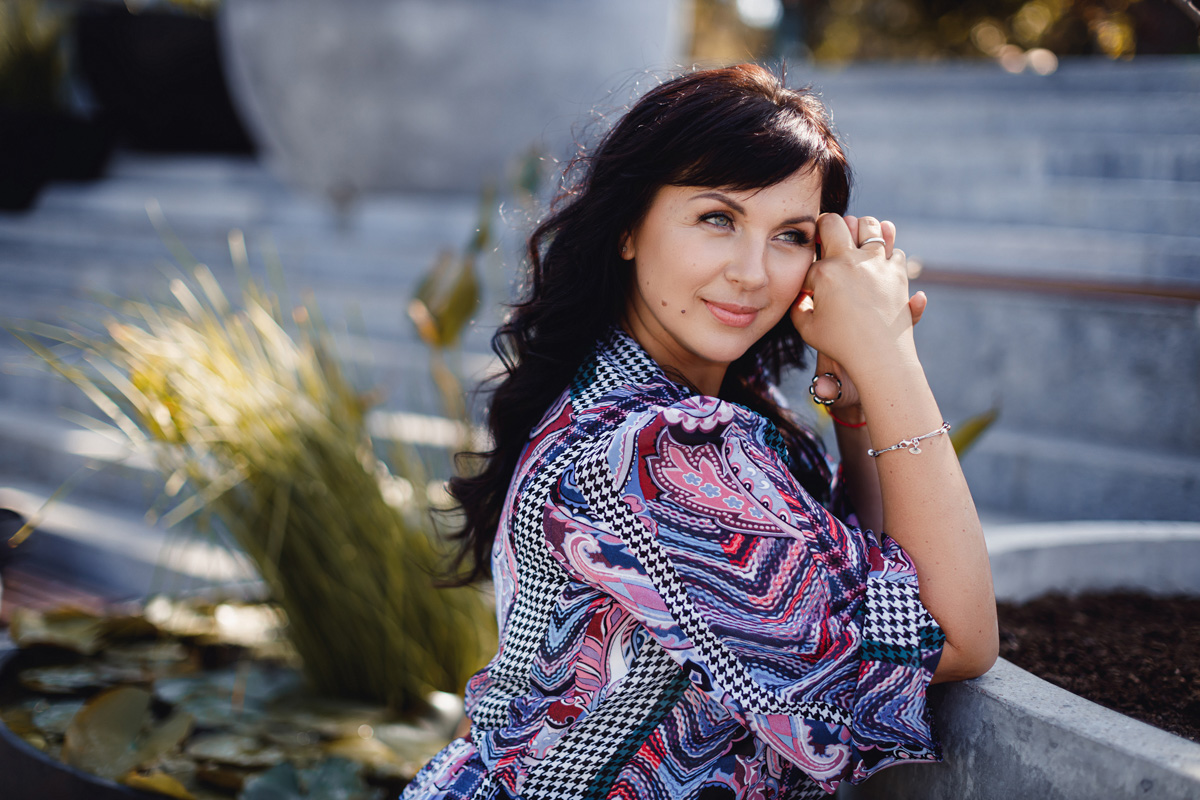 Couple in a photo shoot session, capturing their connection with studio lighting to enhance the mood