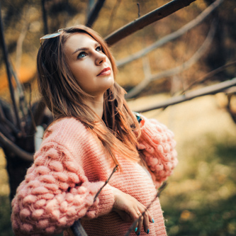 Family portrait in a well-lit studio, capturing a sense of connection and love between all members