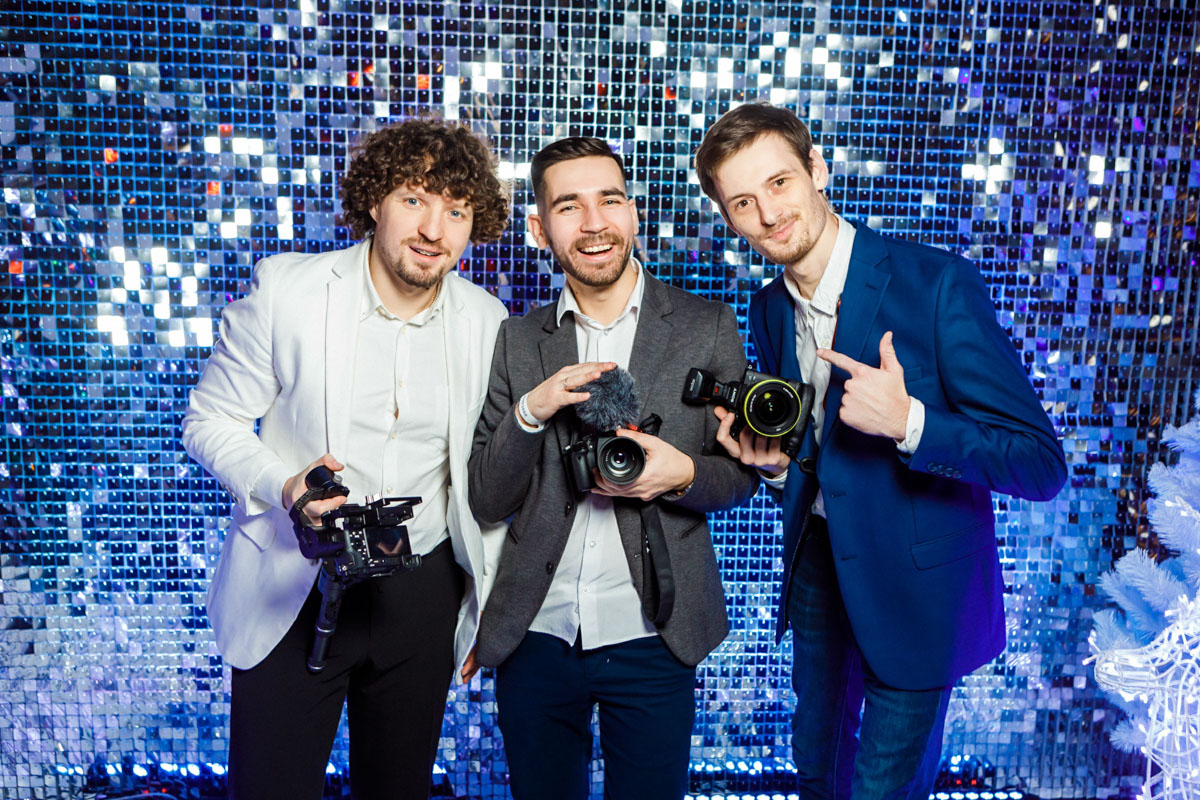 Conference attendees engaging in group discussions during a corporate event in a well-lit seminar room
