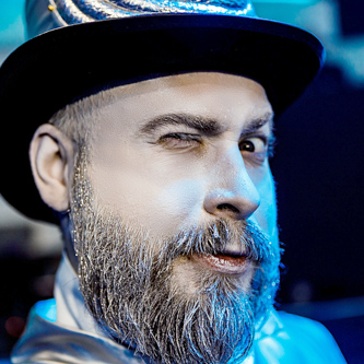 Close-up of a corporate event with audience clapping, photographers using flash to capture the mood