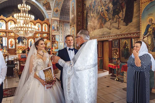 Tanya and Bogdan — Wedding in church, photo 97