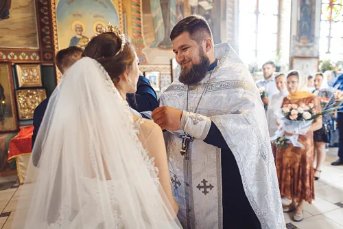 Tanya and Bogdan — Wedding in church, photo 99